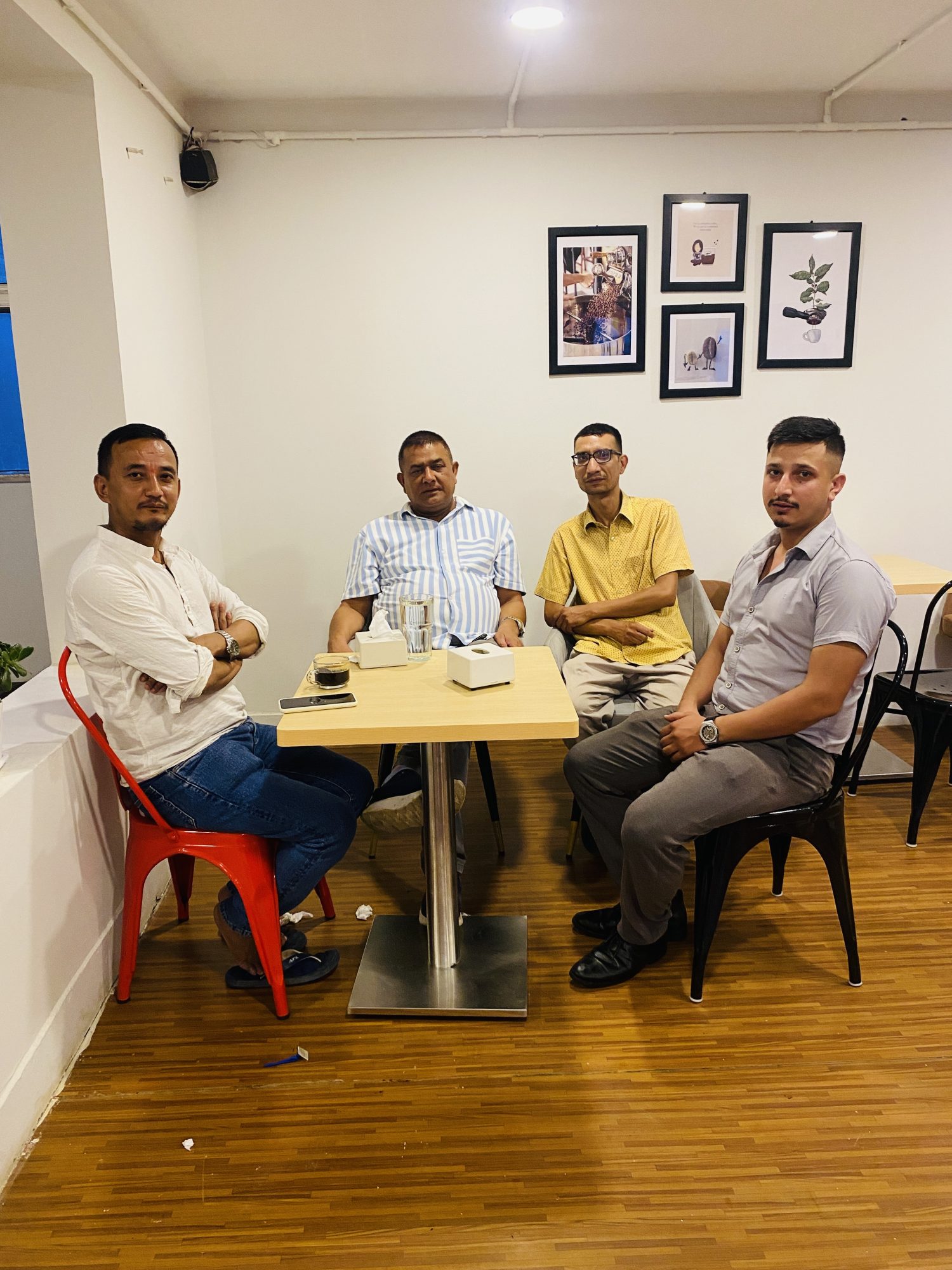 Guests at a table inside Hillside Beans café